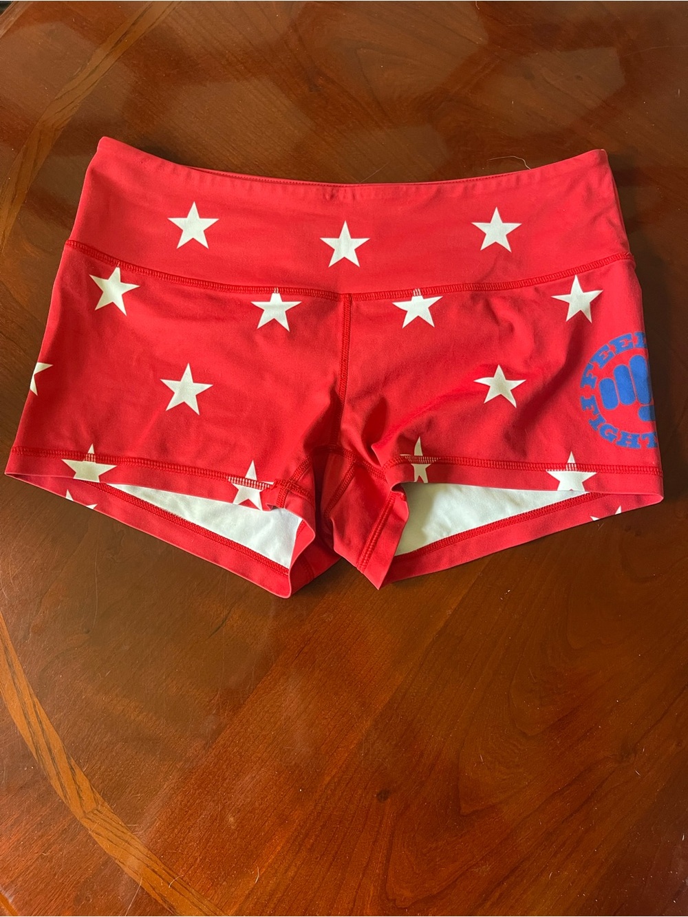 Feed Me Fight Me Red Star-Print Athletic Shorts with Blue Logo
